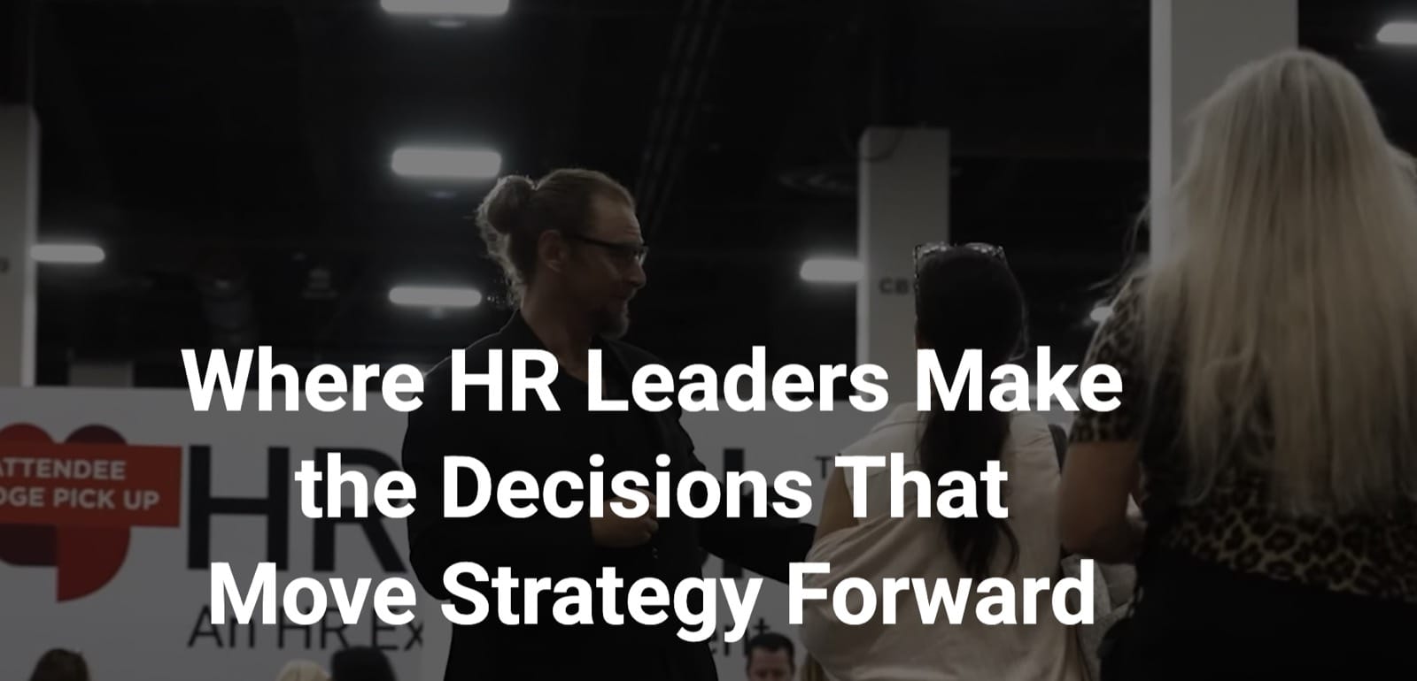 HR Tech conference floor, with the line “Where HR Leaders Make the Decisions That Move Strategy Forward.”